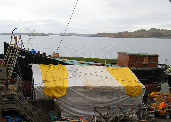 Photograph of the vessel  Auld Reekie pictured at Crinan Boatyard undergoing restoration on 23rd April 2011