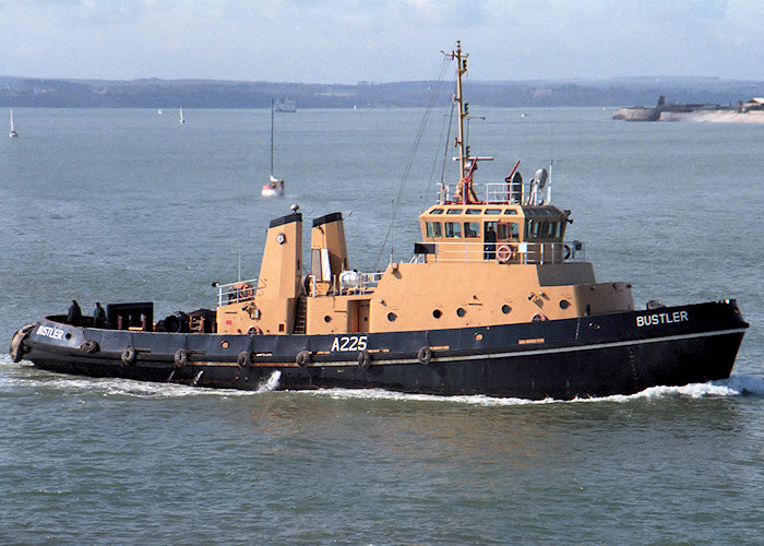 Photograph of the vessel RMAS Bustler pictured at the entrance to Portsmouth Harbour on 1st April 1988