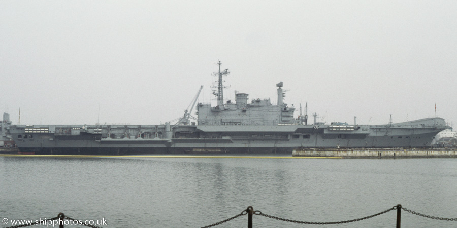 Photograph of the vessel HMS Hermes pictured laid up at Portsmouth Naval Base on 25th August 1984