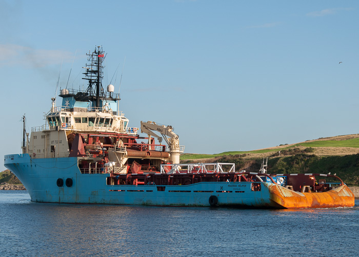 Photograph of the vessel  Maersk Helper pictured departing at Aberdeen on 10th October 2014