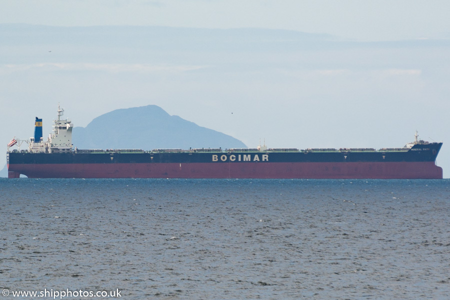 Photograph of the vessel  Mineral Faith pictured at anchor in the Firth of Clyde on 8th June 2015