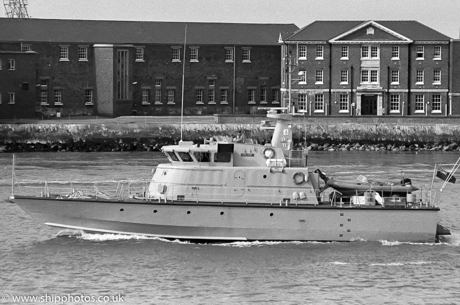 Photograph of the vessel HMCC Valiant pictured departing Portsmouth Harbour on 25th March 1989