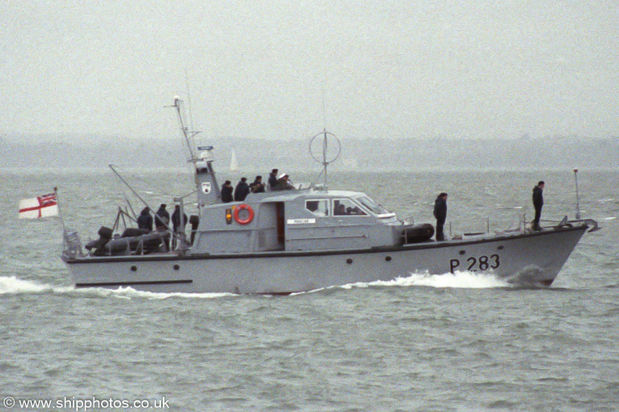 Photograph of the vessel HMS Fencer pictured approaching Portsmouth Harbour on 19th February 1989