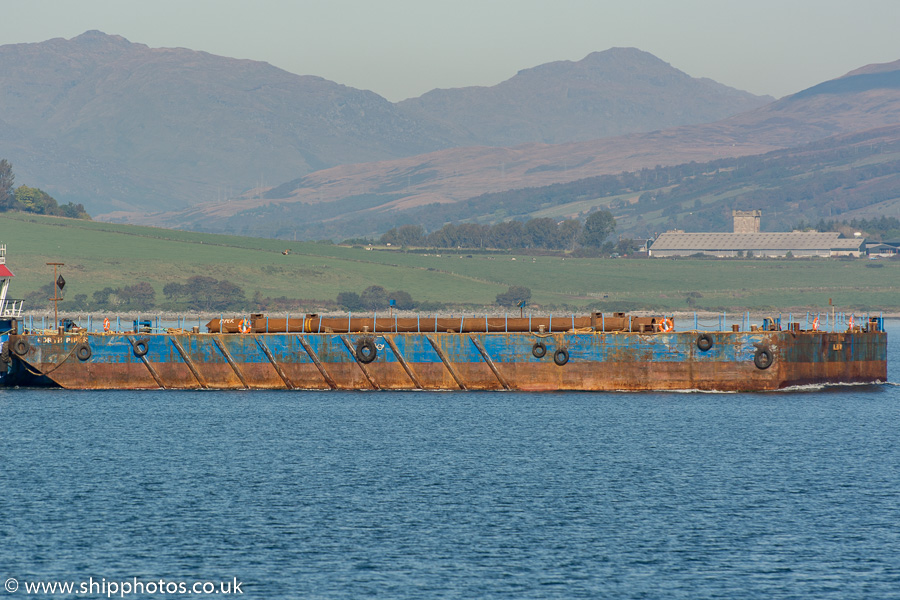 Photograph of the vessel  Forth Piper pictured passing Greenock under tow on 16th October 2015