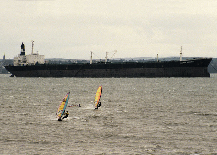 Photograph of the vessel  Happy Norness pictured at anchor in the Solent on 24th March 1990