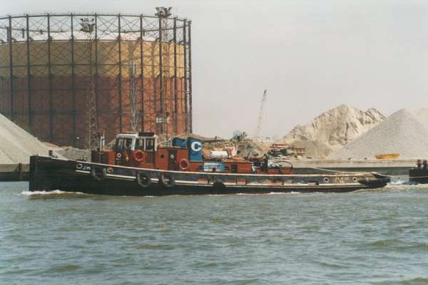 Photograph of the vessel  Jim Higgs pictured on the Thames passing Greenwich on 27th May 1999